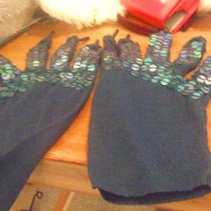 Homemade reptilian gloves.